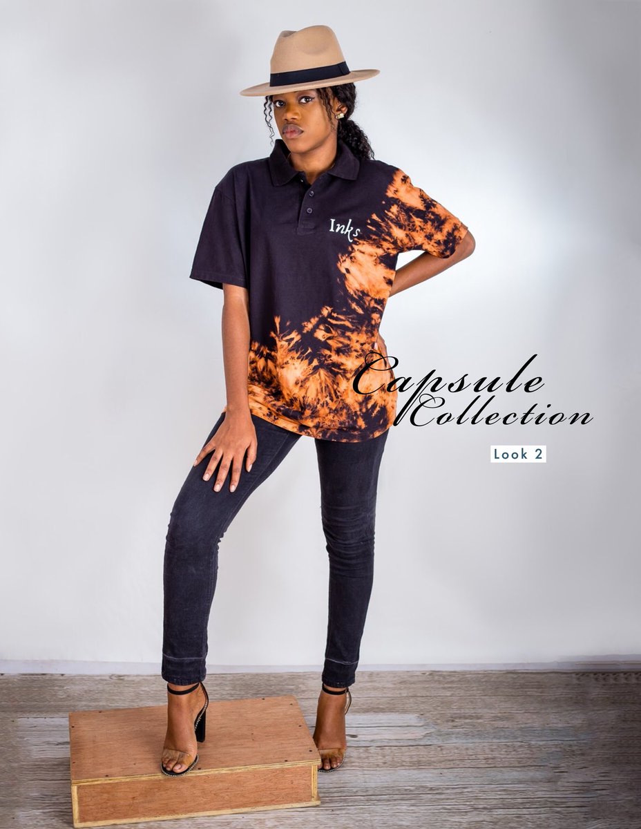 L.O.O.K 2T.U.E.S.D.A.YWe have our beautiful model in a black and orange brown marbled design. We love how the designs start from the hands and run all the way to be bottom of the shirt in a splish splash manner combined with a n inscription of our classy brand name to boot!