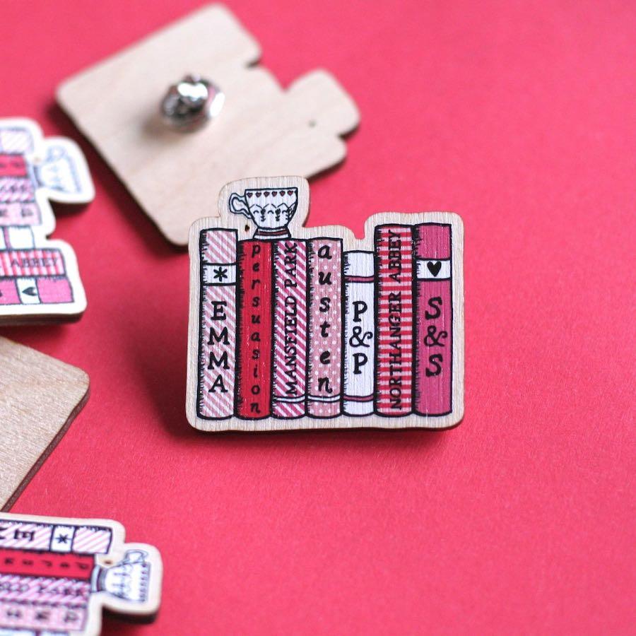 JaneAustenBath's tweet photo. Wooden Jane Austen Books Pin Badge
https://t.co/XpF2FO8TbA
This charming Jane Austen books pin badge features the novels of Austen lined up side by side, and topped off with a dainty china tea cup!
#janeausten #tuesdaytreat  #teatime #janeaustenbadge #regency #bookbadge #janeite https://t.co/z5DfQhfGvP