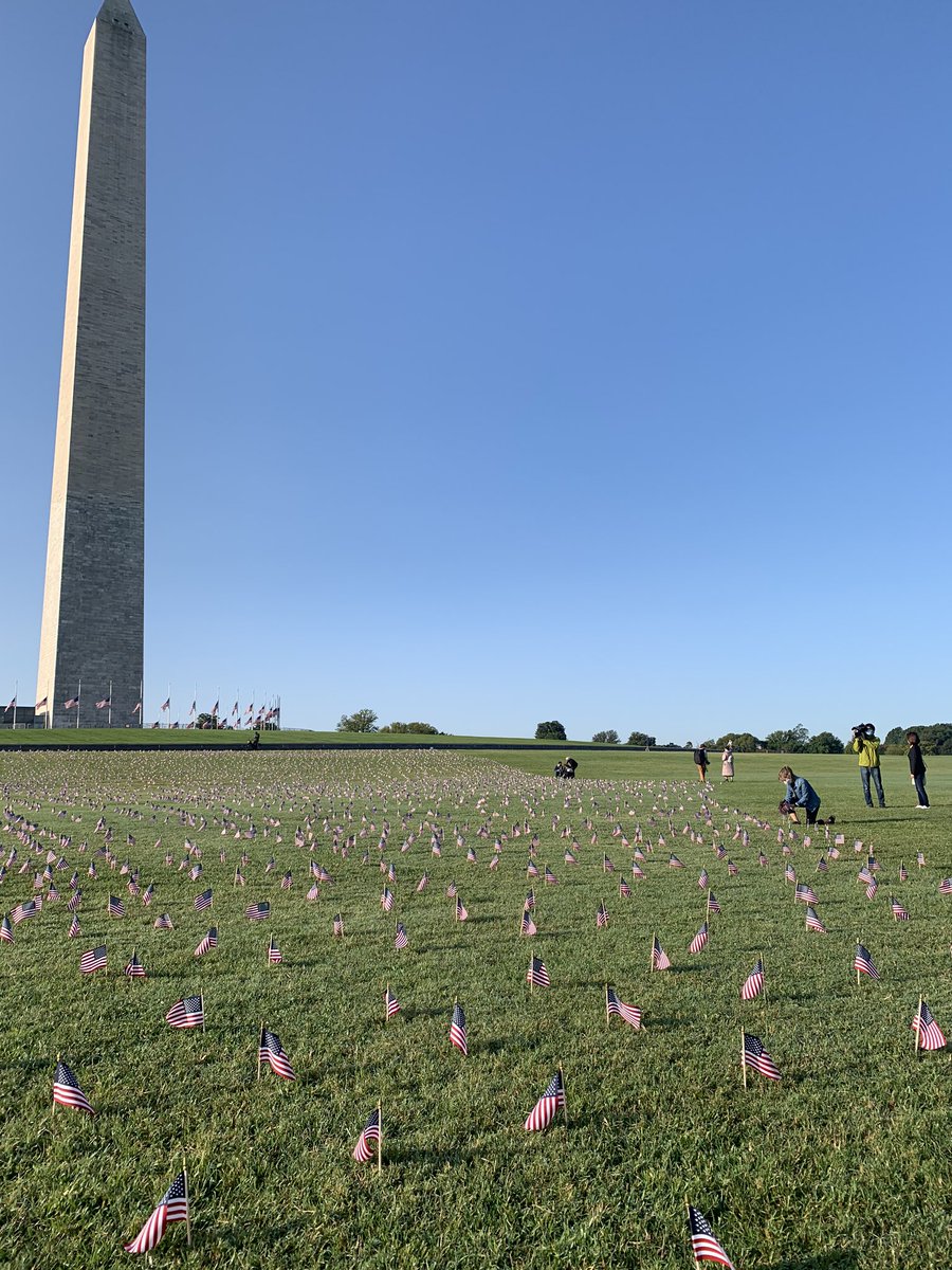 HAPPENING NOW: Volunteers are setting up 200,000 American flags outside of the Washington Monument in memory of the victims of COVID-19. @SpeakerPelosi is set to speak at an interfaith service here soon.