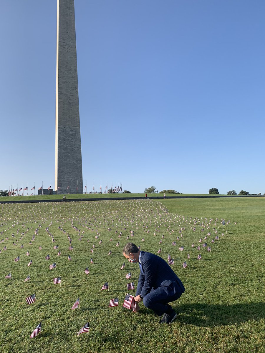 Illinois Rep.  @SeanCasten is here setting up flags. “People are dead because [Trump] somehow decided it was cute to politicize science... These people didn’t have to die,” Casten told me, pointing at the flags. “Yeah, I’m angry.”