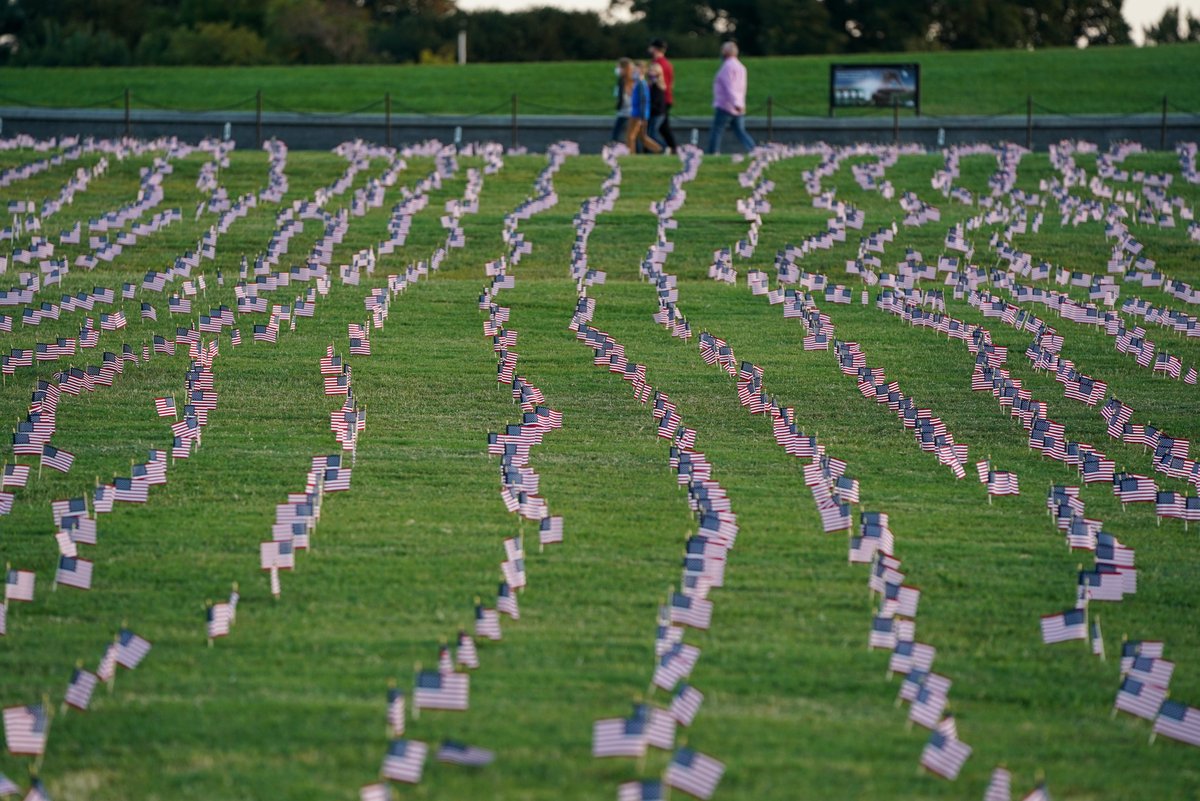 NBCNews's tweet image. Thousands of American flags, seen on the National Mall in Washington, DC, were placed by the Covid Memorial Project to mark more than 200,000 deaths in the US.

📷 Joshua Roberts / Bloomberg via Getty
