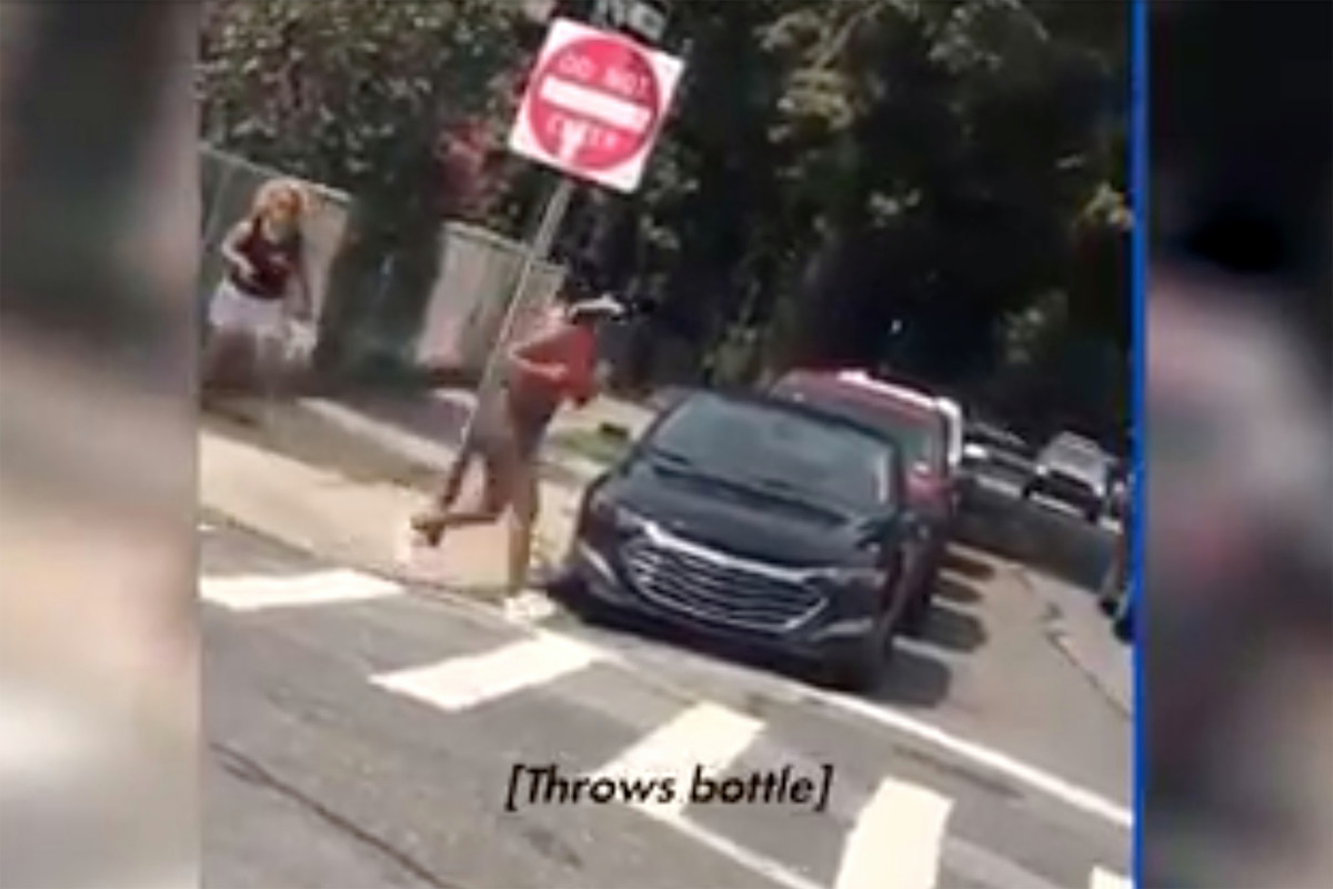 Woman charged with chucking bottle, yelling N-word at jogger held on bail trib.al/5cOLZb7