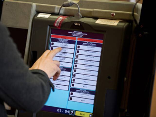 With Electronic Voting Systems an instructional tutorial is provided before you vote. You simply look at the screen, make your selection (touch screen) and when you have cast your vote, you touch the “Cast my Vote” button that is located at the bottom of the screen.