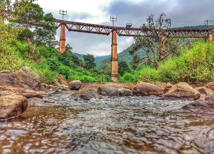 Train line passes through Koraput, Jeypore * After crossing two small stations , the train starts climbing up the hills through tunnels and bridges. Most of the time valley falls in right side of the train. Which is one of the most beautiful and scary rail line of India5/n