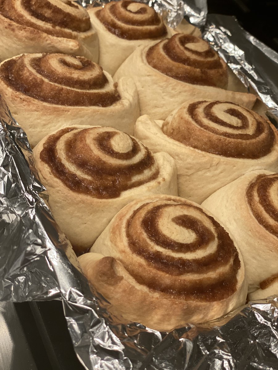 I showed up for a front-yard coffee meet-up with a couple of these things and got to see friends smile :) so that was nice. Here's how they look without frosting, which is how I prefer my cinnamon buns tbh.