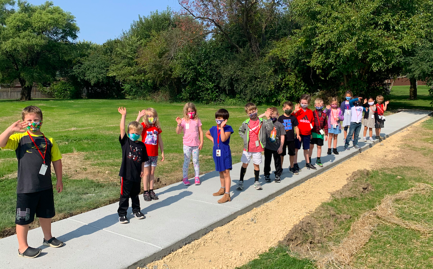 These first graders from Mrs. Kirchner's class were happy to share a shout out to Mr. Schantz, our Director of Building and Grounds, for his role in getting a sidewalk installed to connect our property to Saturn Park. #Community #MiltonPride