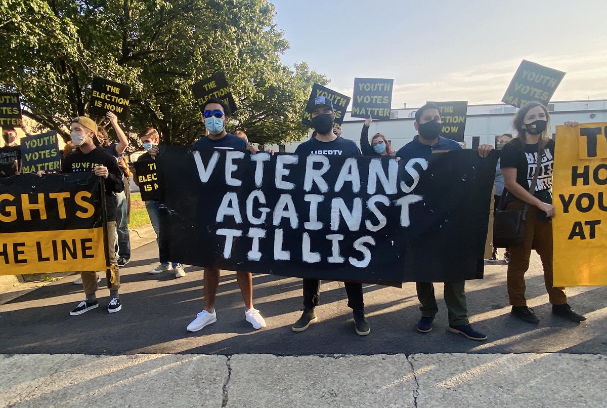 commondefense's tweet photo. The people united will never be divided! ✊🏼 
NC Veterans w/Common Defense &amp; youth organizers from @SunriseRaleigh are outside the #NCSenateDebate between @ThomTillis and @CalforNC to demand Tillis to delay a vote on a @Scotus nomination. https://t.co/yv1ghmIP8J