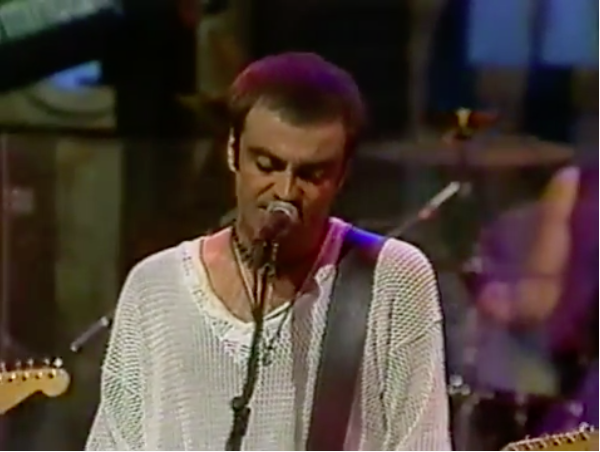 rob dickinson of catherine wheel with the strong look here: white mesh and a bold necklace. not sure what's up with these other dudes