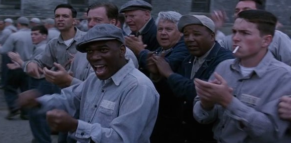 Morgan Freeman’s son has a double role in the movie. He is seen in the scene when Andy Dufrense enters the prison for the first time and also as a mugshot of the young Red. Interestingly, he has a blink and you miss cameo in Se7en that was released in 1995.