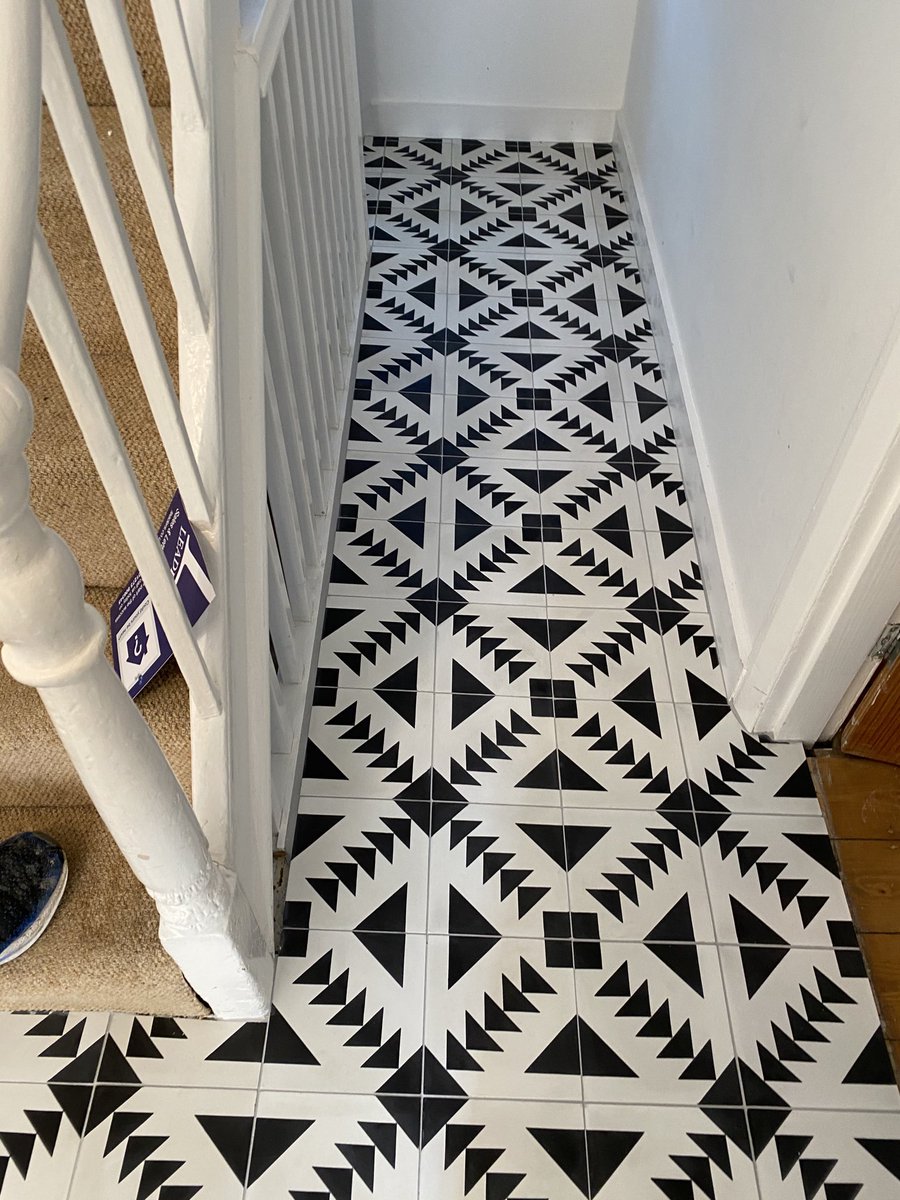 JBTiling's tweet image. Hallway tiled with cement encaustic tiles