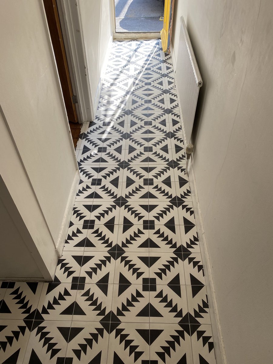 JBTiling's tweet image. Hallway tiled with cement encaustic tiles