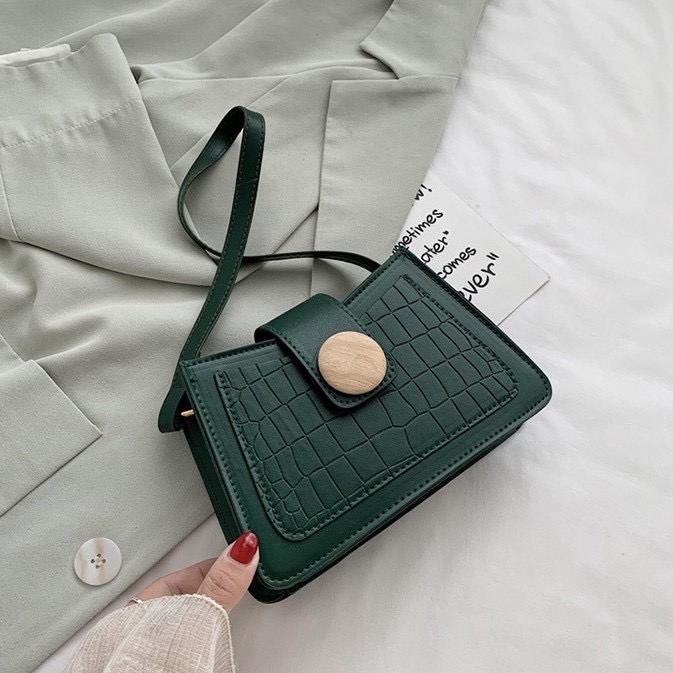 Wood Button Bag Peice ; RM29 only READY STOCK  POSTAGE : SM RM8 / SS RM11Product Info:Available : Purple, Beige, Green & BlackSize: 20cm(L) x 5cm(w) x 13cm(H)Pu Leather