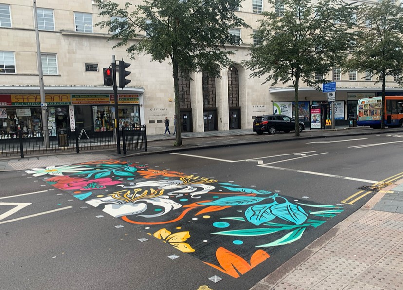 CityMayorLeic's tweet photo. Charles Street is looking bright with some brilliant artwork at pedestrian crossings - thanks to Graffwerks. Would you like to see more across #Leicester?! https://t.co/8UmqdEds2R