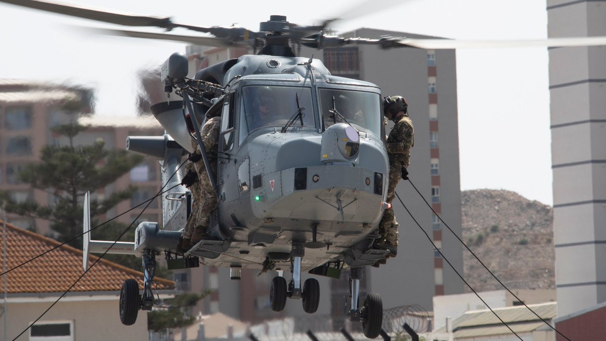 Just dropping in. In a stunning display of stealth and skill, #RoyalMarines of @42_commando abseiled more than 200ft from an @847NAS Wildcat helicopter during training in Gibraltar. 🔗Read more: ow.ly/Zcd250ByTkA