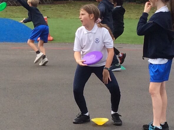 AshdenePrimary's tweet photo. Target practice in PE today. Not sure about Grace’s technique though! #monkeypose #ultimatefrisbee https://t.co/BJnzGTlgBE