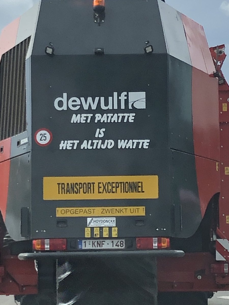 Driving behind a harvester in Flanders (translated: there is always something with potatoes)