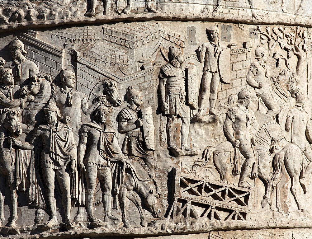 of Roman society and institutions. They are almost Prussian-like and, at times, there is a confluence between their perception as anal-retentive engineers and how we satirize German militarism and neatness. Here is an example from a little later. A relief from Trajan's Column.