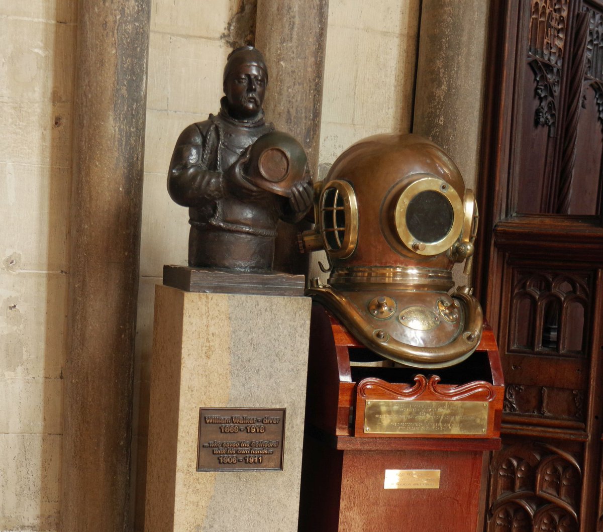 3/n Sculpture to William Walker inside the cathedral, 1869~1918, a diver who "saved the [Winchester] Cathedral with his own hands", working underwater & often in the dark on the foundations shoring up the cathedral, then under threat from continual flooding & erosion. My photo