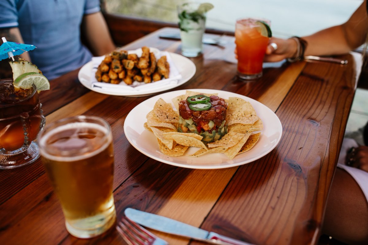 Cheers to outdoor dining! 🍻  Join us on our patio and dock Tues-Thurs 12-8pm, Fri-Sat 12-8:30pm &amp; Sun 12-8pm. Tag a friend you want to have ahi poke &amp; fried zucchini with!