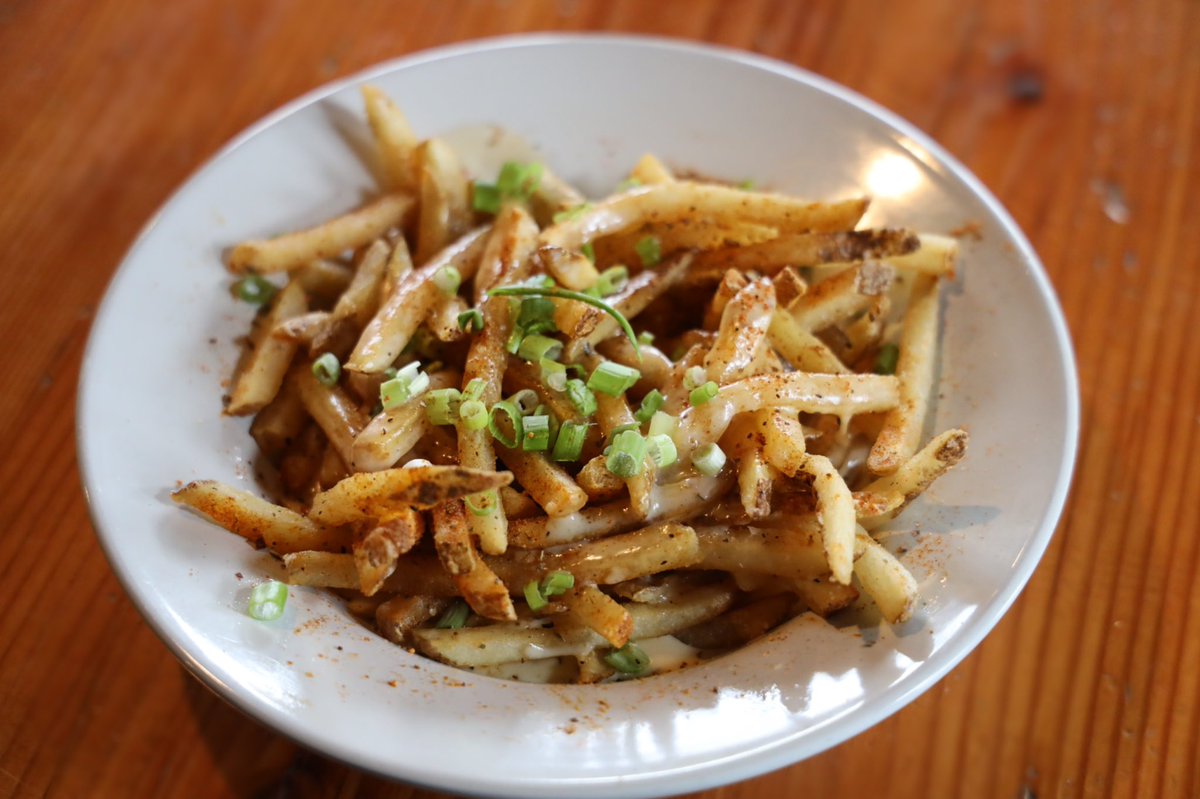 You better not be crabby for these Crab fries 🤓 Our Crab Fries are smothered in Old Bay seasoning, mac sauce &amp; green onion...YUM
.
.
.
.
.