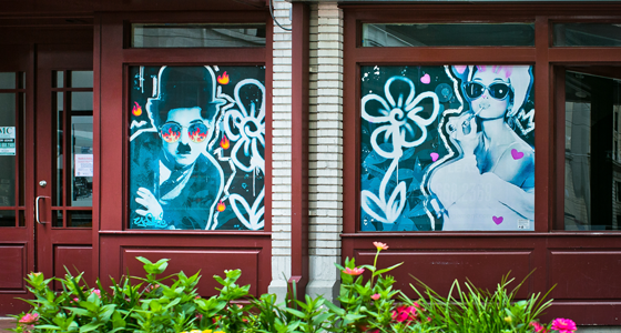 MarketSquareHou's tweet photo. ICYMI, there's a lot more public art in town! Thanks to @DowntownHouston &amp; @UpArtStudio, #WindowWorks transforms vacant windows w/ vibrant art. Located @ 300 Main, Audrey/Chaplin [by #yoshioromero] re-imagines two icons complete with social media filters and all. #ArtBlocksHou https://t.co/B8DzGKHK7U