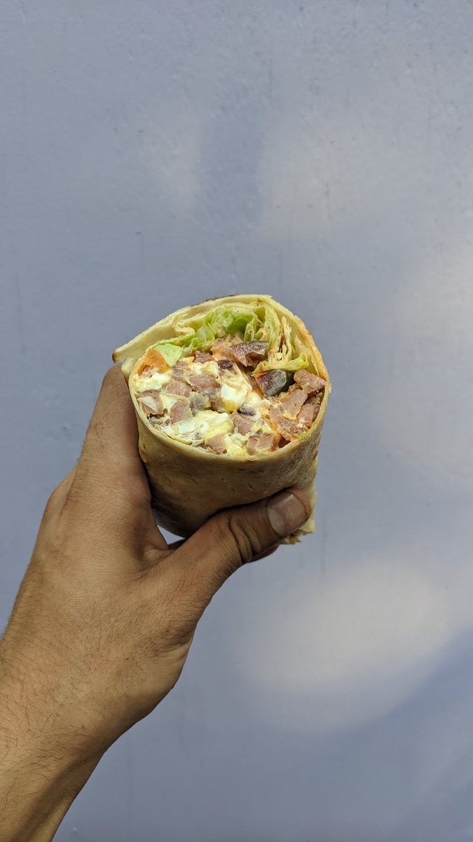 When the kitchen makes a meal for the staff, you get to go off menu a little. Spam breakfast burrito with onion, egg, cheese, lettuce, tomato, avocado and whatever sauces we desire! 

#BreakfastBurritoForDinner
#KitchenBehindTheScenes
#Gowanus
