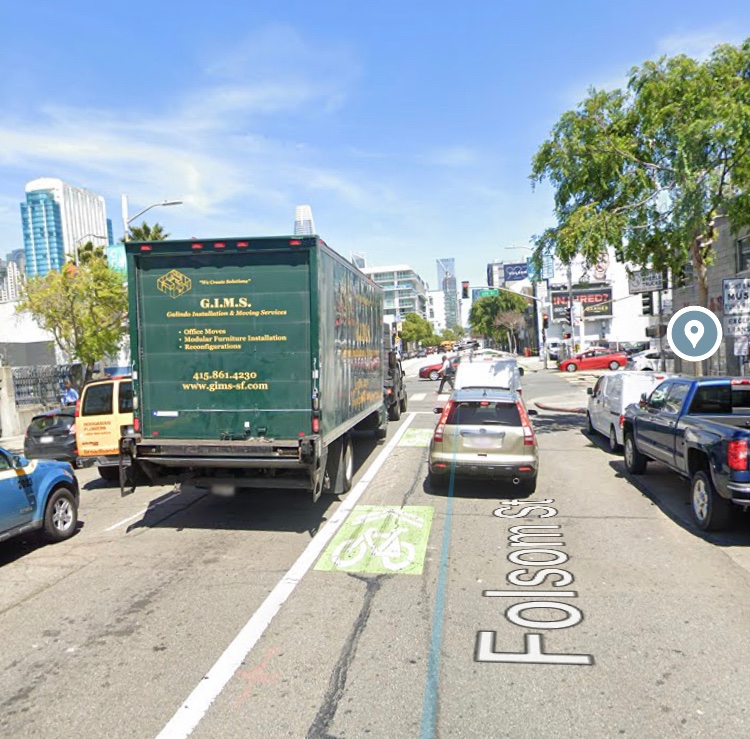 The city recently announced a quick-build project from 5th to 2nd to fill a gap in the network on Folsom. But the new project doesn’t address the holes in the existing “protected” lane. No protection at 6th & Folsom where Amelie was killed by a turning truck.