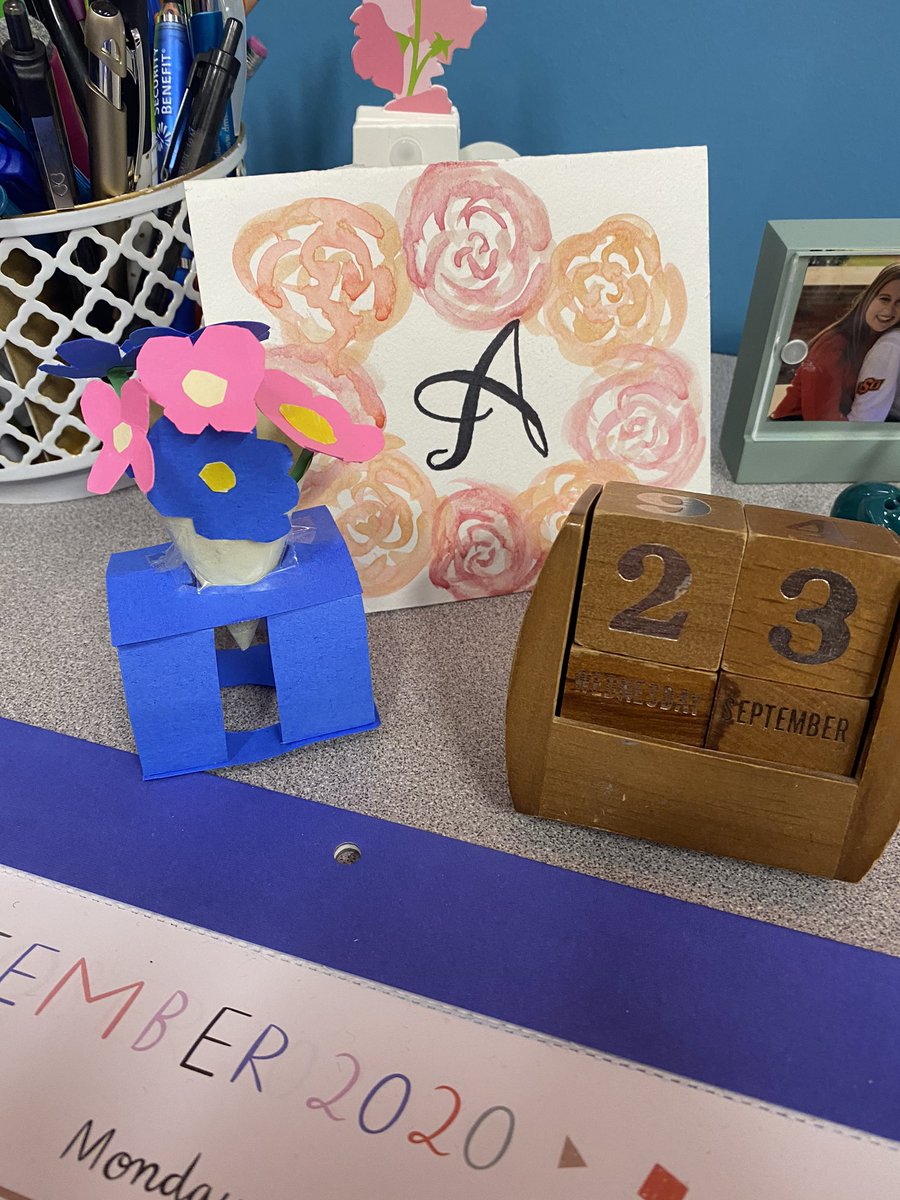 This corner of my desk brings me so much joy! A card made by a parent with a heartfelt note from the spring, a calendar that sat on the desk of one of my favorite high school teachers her entire career and paper flowers given to me by a student today ❤️ #BHSticksTogether