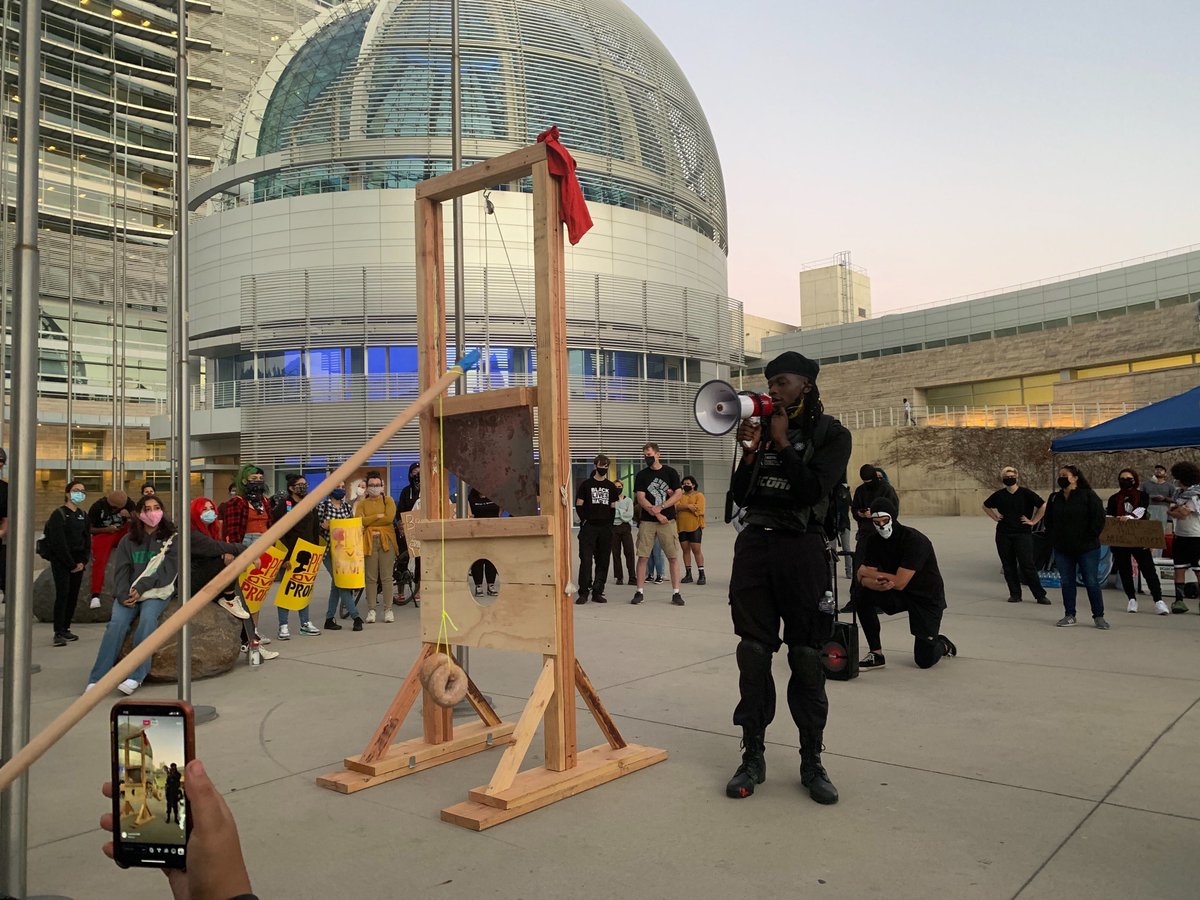 The group of demonstrators outside San Jose City Hall has grown to about 200. Among them was Lou Dimes, leader of B.L.A.C.K. Outreach San Jose. He stood at the base of a wooden guillotine assembled in front of City Hall.  https://www.sfchronicle.com/bayarea/article/Live-updates-on-Breonna-Taylor-case-Protest-15592633.php