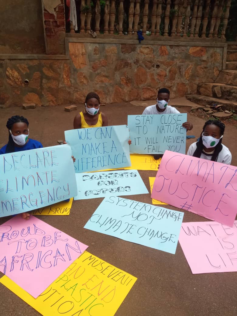 Fridays4FutureU's tweet photo. TOMORROW IS THE GLOBAL DAY OF CLIMATE JUSTICE!

Uganda is ready.

Together we can create a safer, cleaner and healthier planet.

Join us! We need everyone!
#FridaysForFuture 
#FightClimateInjustice https://t.co/IXq8Tfsxfn
