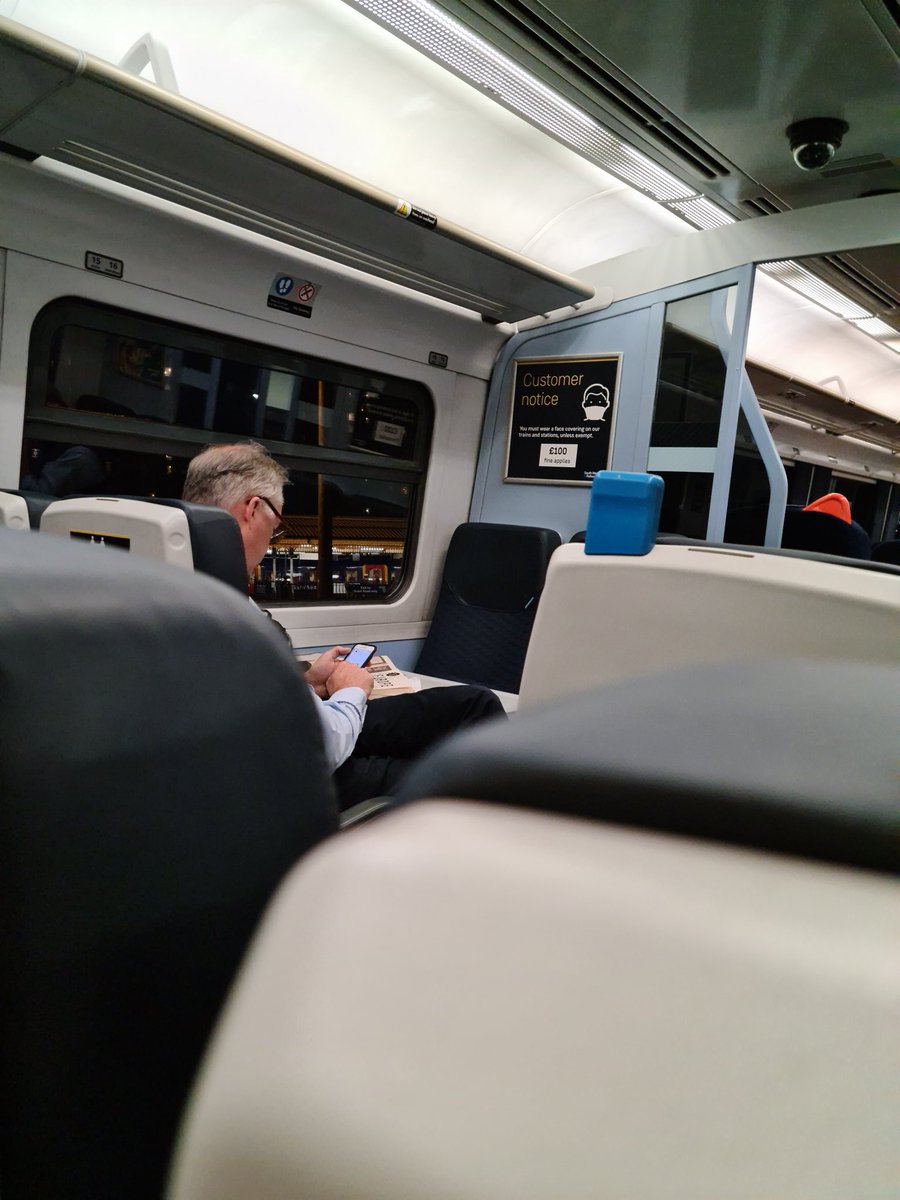 yaumatron's tweet photo. @SW_Help @SW_Railway Will there be any enforcement on wearing masks? He's sat right in front of the customer notice &amp; a guard has just walked past and done nothing. He had one dangling off his ear a second ago so I presume he is not exempt...19.20 from Waterloo to Exeter St David https://t.co/KWQD18ppOB