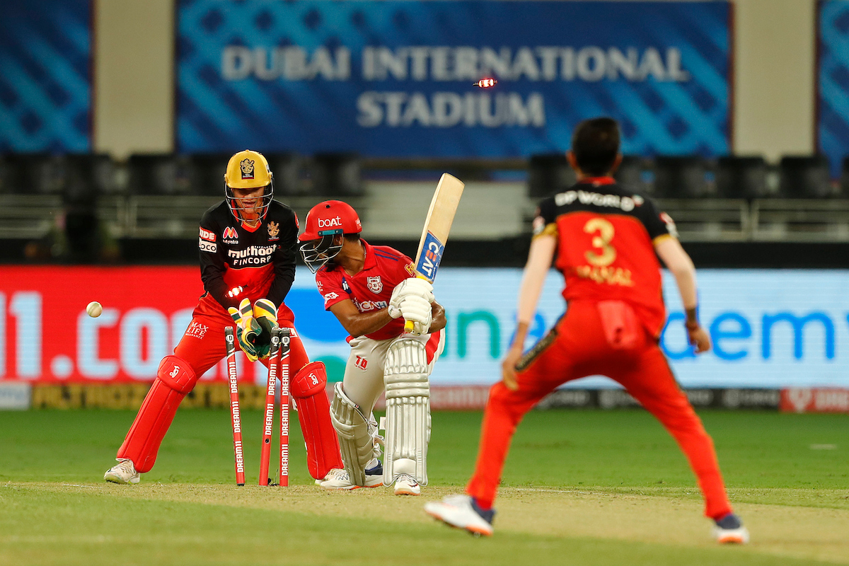 IPL's tweet photo. A delightful googly to get the wicket of Mayank Agarwal.

@yuzi_chahal means serious business here.

#KXIPvRCB #Dream11IPL https://t.co/qWrDFHZssB