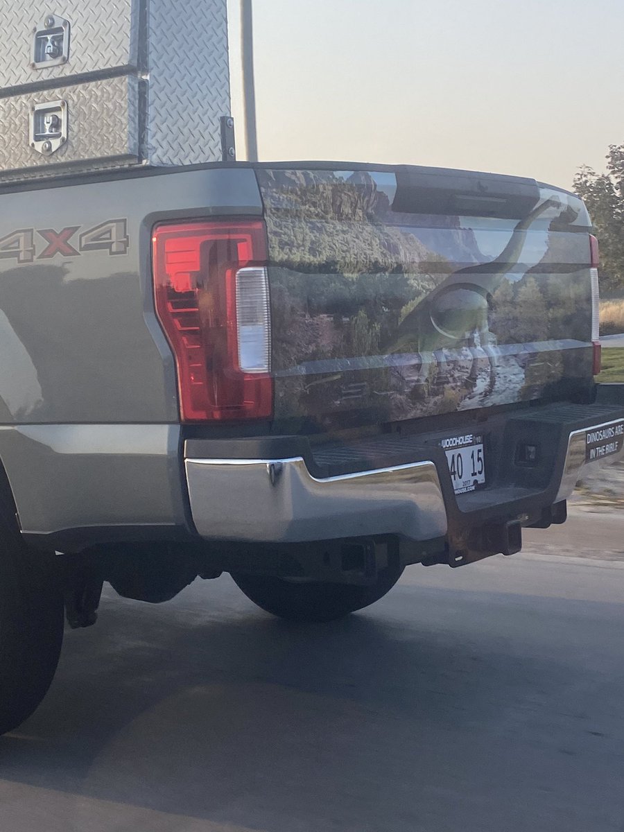 It’s hard to see but that’s a black 10 sticker. Mr Dinosaur here has been expired for darn near a year tootling around town like taxes don’t need to be paid #gototheDMV #dinosaursareinthebible #thatswhathisbumperstickersaid <a href="/NebraskaDMV/">Nebraska DMV</a>