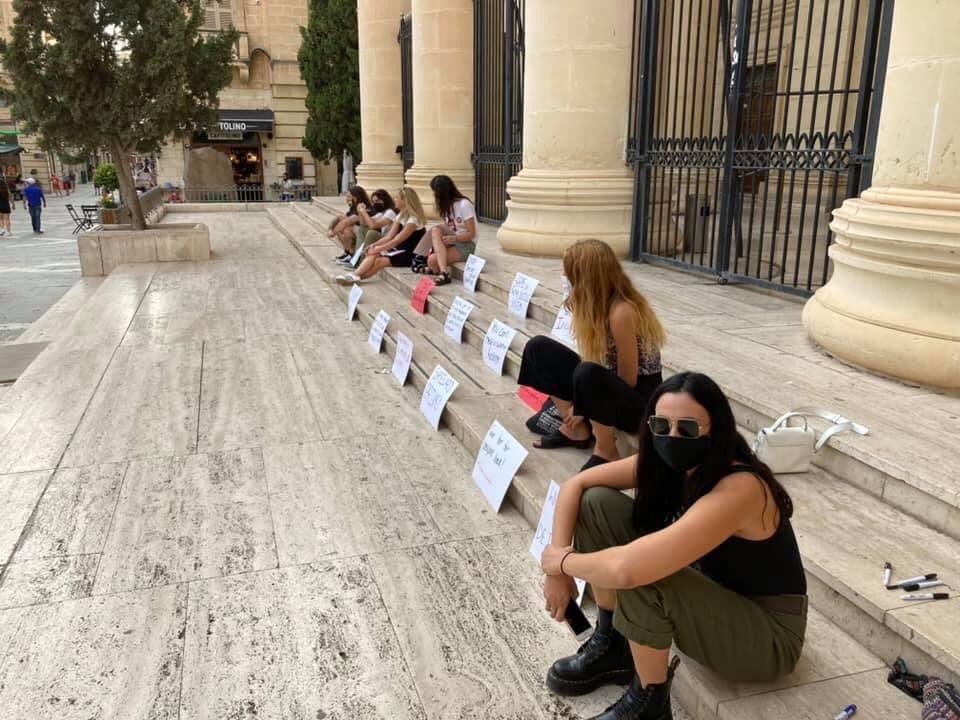 V4CMalta's tweet photo. Young Progressive Beings, members of our coalition, at #Malta’s law courts.

“Today’s demonstration over this morning’s hearing. We will not back down: GIVE HER BACK HER PASSPORT.” https://t.co/B0CWdhacoT