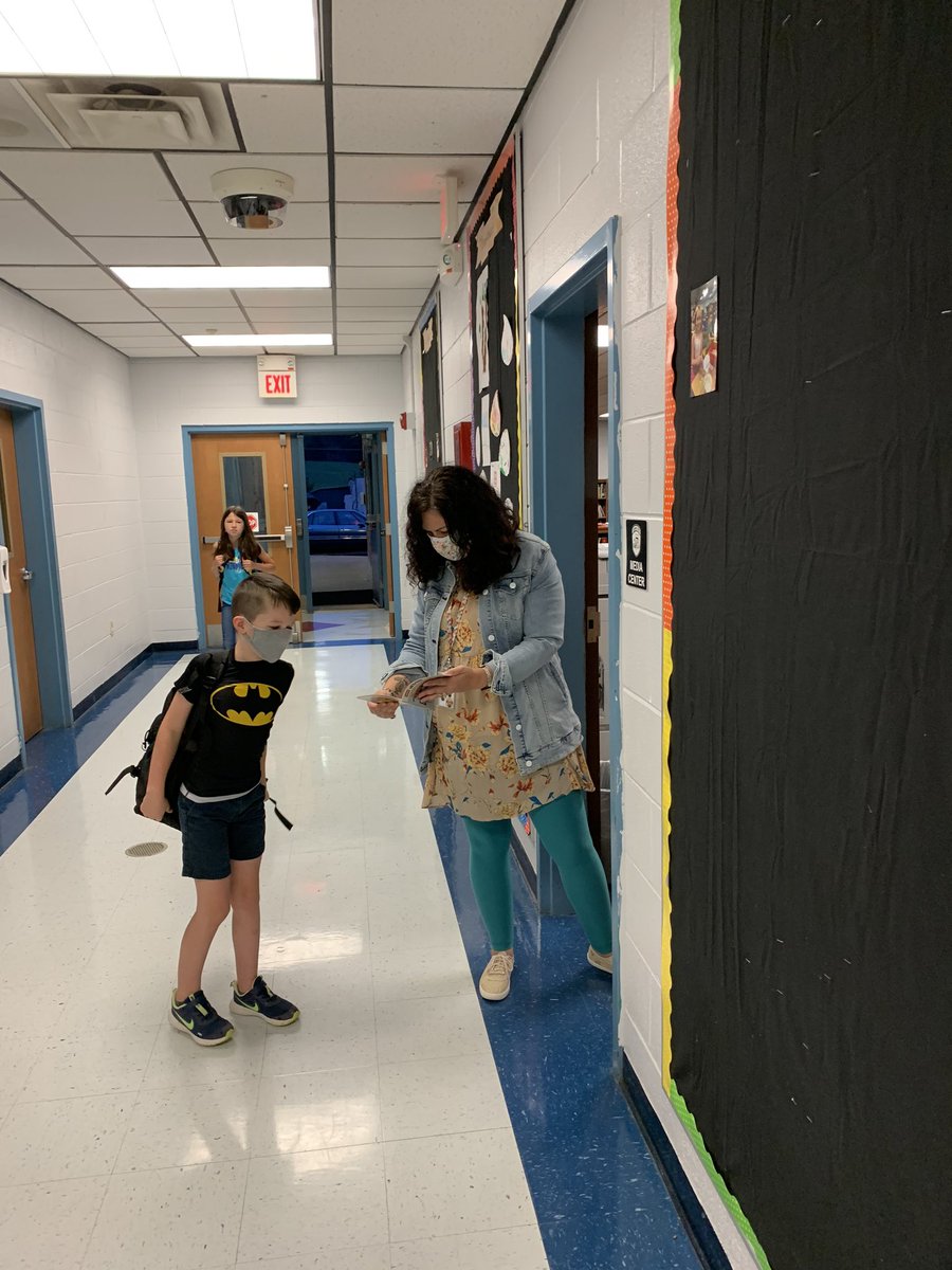 It is awesome to see a student enter the building with such excitement, ready to share his book with Mrs. Raines! #NES2020 #RamblerReady