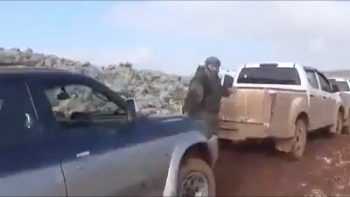 I have no idea what this HTS "jihadist" is wearing, but it's functional.The darks patches were covered by equipment. The light areas are the result of dust.He did NOT want to be filmed.