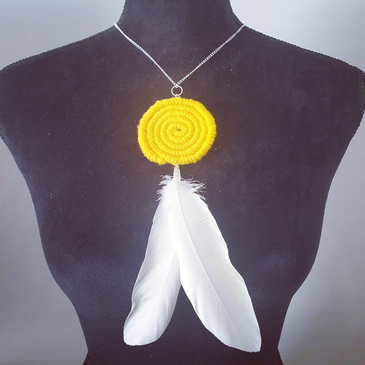 waybarra's tweet photo. White Cockatoo Feather Necklace 💛 #Aboriginal #Indigenous #art #culture #jewellery #necklace #coiled #aboriginaljewellery #aboriginalweaving #blackbusiness #cockatoo https://t.co/VOFEPKrRrC