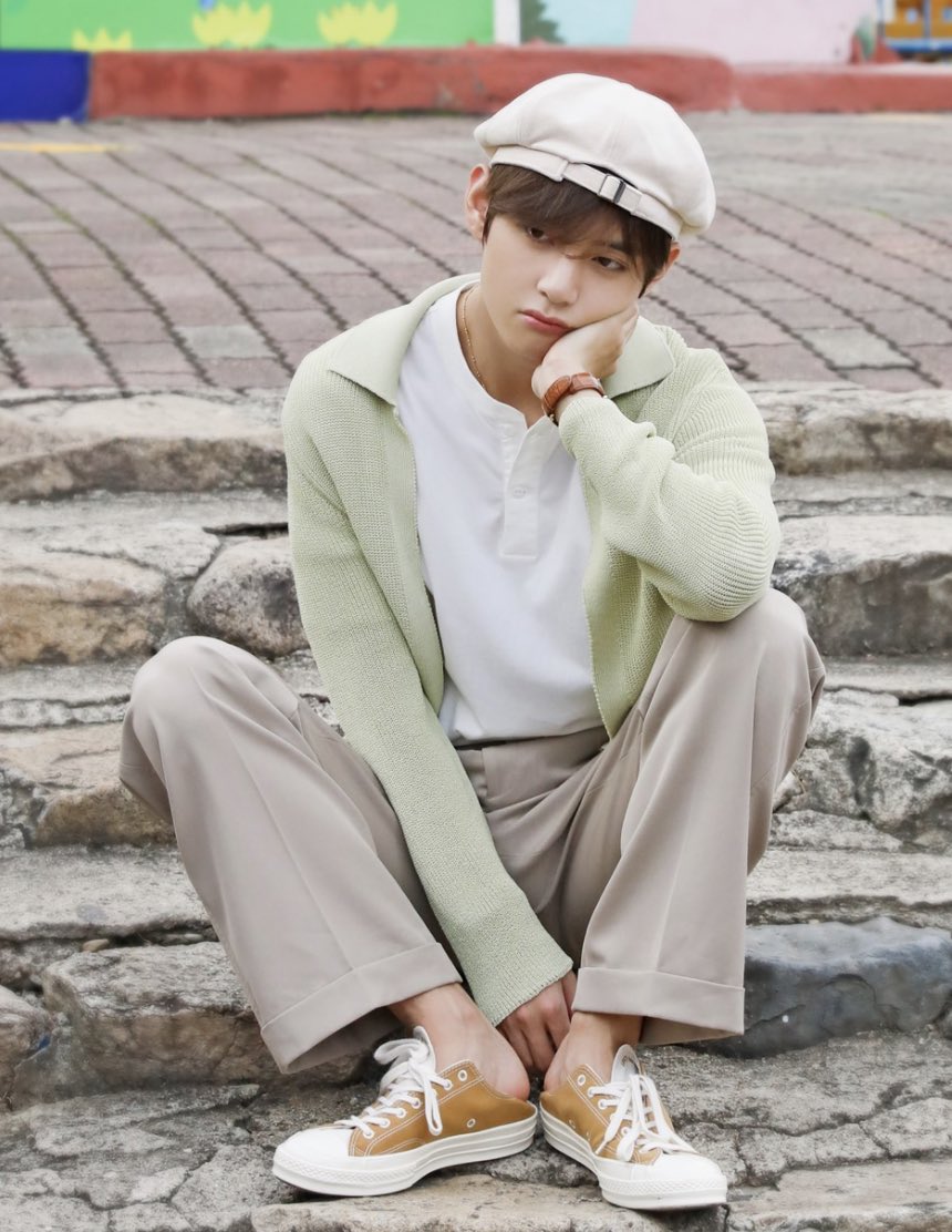 Casually wearing his shoes like this during a photoshoot