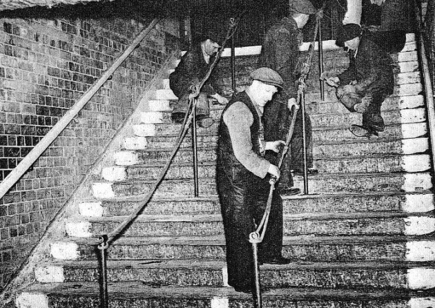 7  #NVHOW20 It was clear that crush barriers had not previously been considered at shelter entrances. The staircase was 'in the open air' throughout the Blitz, & puddles had to be swept when it rained. The Inquiry concluded that a crowd surge pushed people down the stairs.