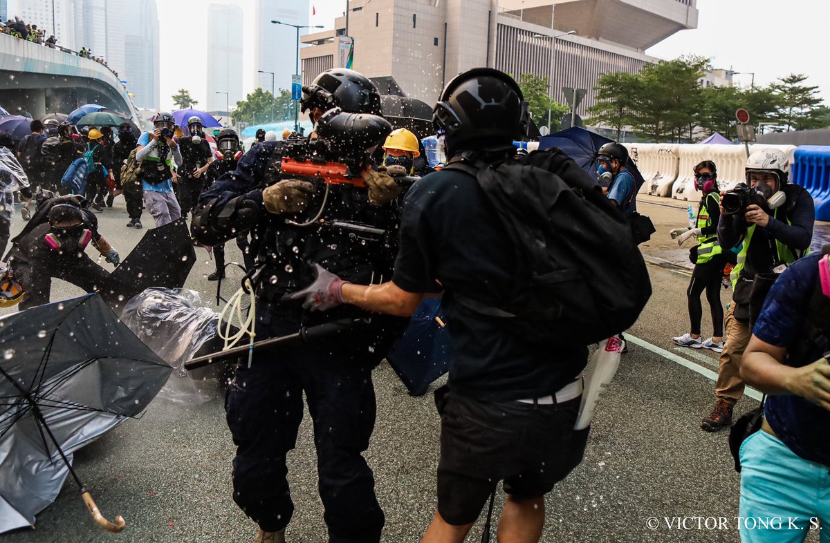 victks02's tweet photo. A citizen was arrested for unauthorised possession of firearm &amp; incitement to split the state. He owned a pepper ball pistol and propaganda of #Hongkongindependence. 

This is a recap on how the Hong Kong police force fire pepper ball rifles on Hong Kong citizens a year ago. https://t.co/nXeJBPN0tF