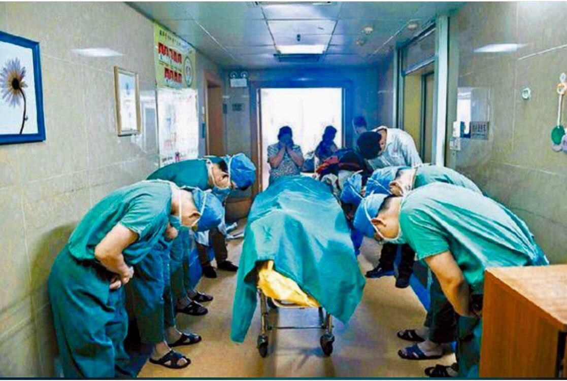 Chinese doctors bowing down to a boy, age 11, with brain #cancer who saved many lives donating his organs. (via @10MillionMiler)