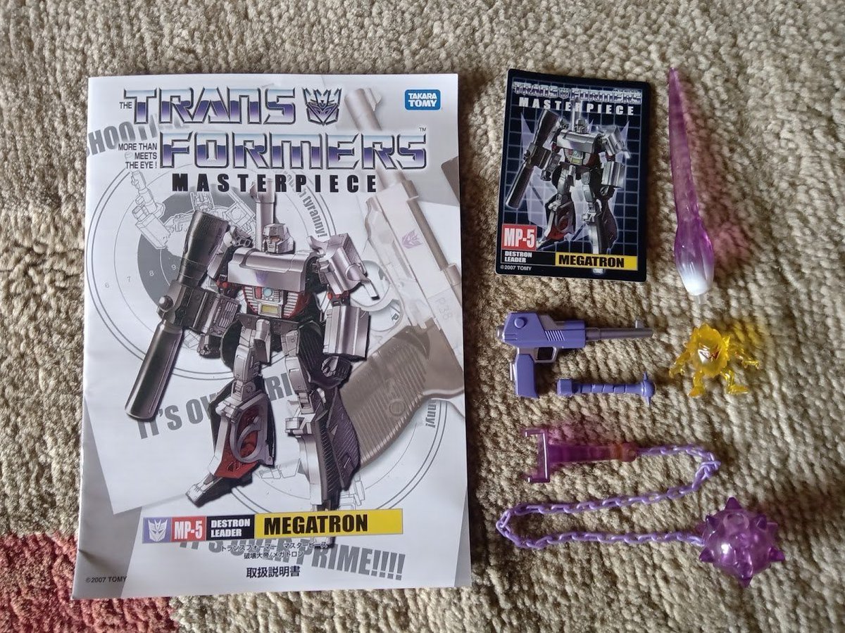 Masterpiece MP-05 Megatron - £40Typical scuffs to silver paint and rust on die-cast parts, inc. pin in mace, which has discoloured surrounding plastic. Right shoulder is loose; can't hold up weight of cannon. Small black clip from left hip-plate is broken off and not present.