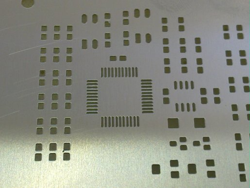 stencil masks, btw, are basically just a piece of metal that's got holes cut into it to match up with the pads on the PCB.So you can apply solder paste to it and it'll only end up on the parts of the PCB that need it.