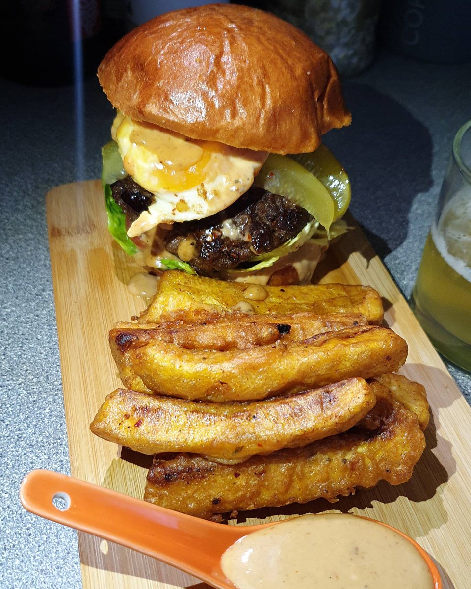 Chefvivianj's tweet photo. Full stack messy burger with fried egg. Served with plantain fries &amp; cassava fries with spicy jerk mayo dip

Using @waitroseandpartners
Finest Heston Brioche Buns and washed down with the best beer around @beavertownbeer

#friday #fridayvibes #fridaymood #fridaynight #cheflife https://t.co/SahNHZ7C5e