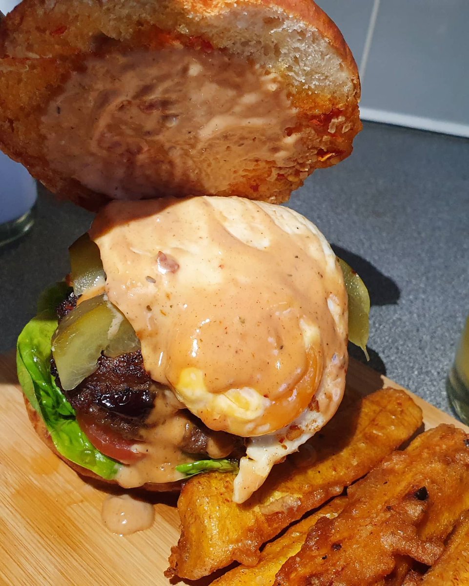 Chefvivianj's tweet photo. Full stack messy burger with fried egg. Served with plantain fries &amp; cassava fries with spicy jerk mayo dip

Using @waitroseandpartners
Finest Heston Brioche Buns and washed down with the best beer around @beavertownbeer

#friday #fridayvibes #fridaymood #fridaynight #cheflife https://t.co/SahNHZ7C5e