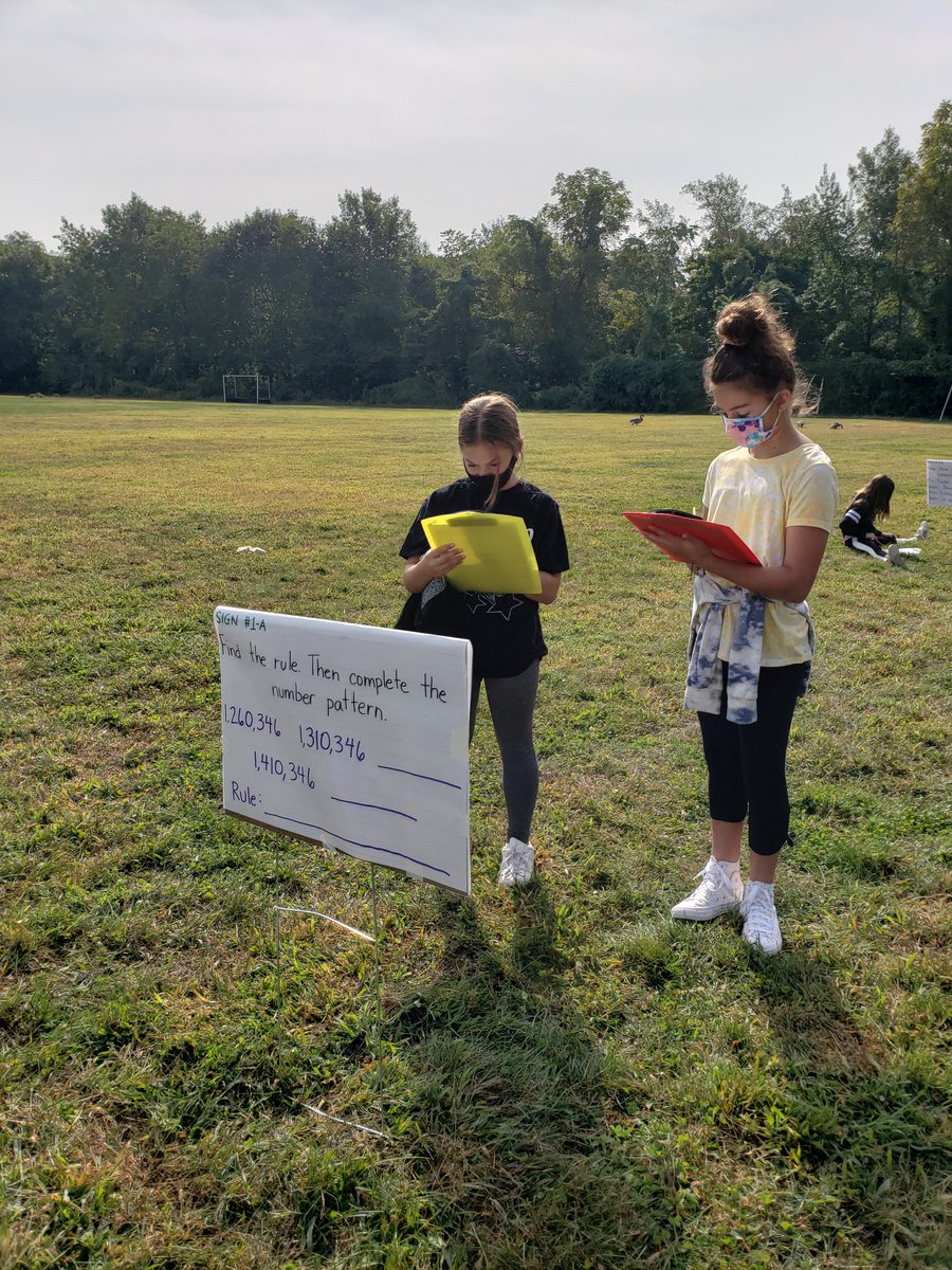 GoodstoneMrs's tweet image. Reviewing for our math test outside.  Problems on lawn signs!