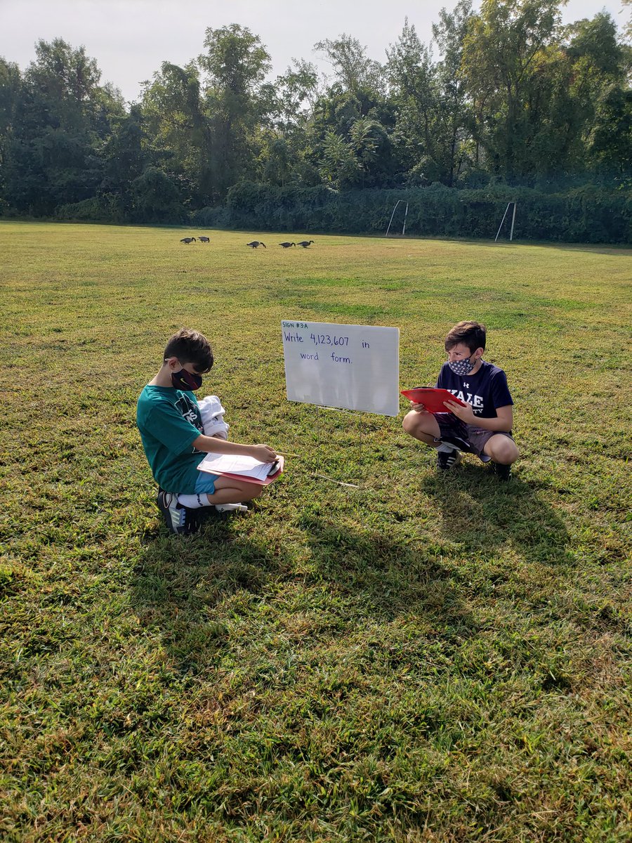 GoodstoneMrs's tweet image. Reviewing for our math test outside.  Problems on lawn signs!