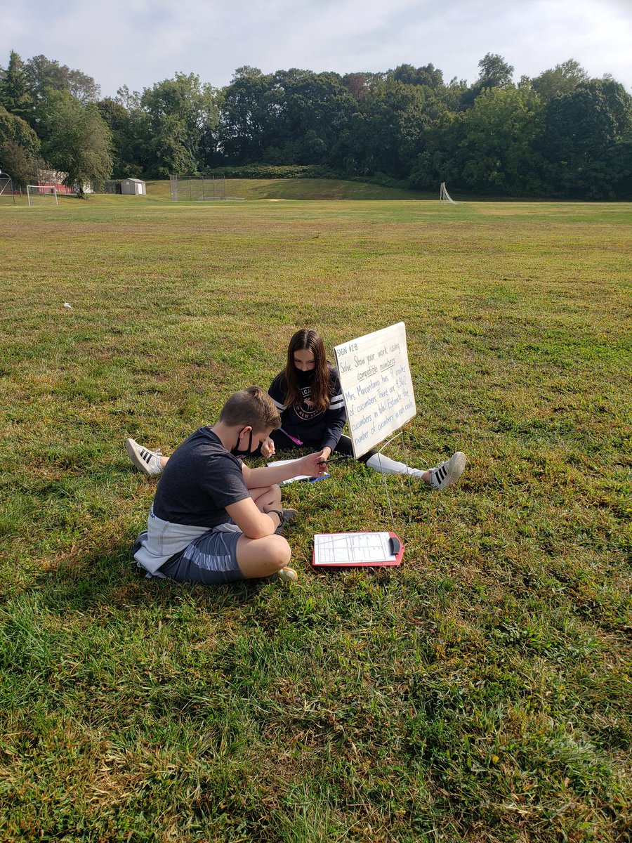 GoodstoneMrs's tweet image. Reviewing for our math test outside.  Problems on lawn signs!