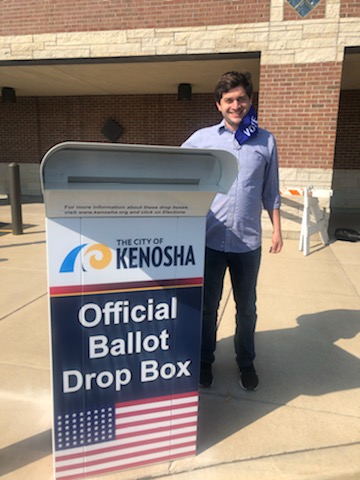 Tip4WI's tweet image. Voting absentee in the City of Kenosha is fun, easy, and essential for our democracy. For those of us on the north side, the Northside Library's Ballot Box is now up and running for your convenience!