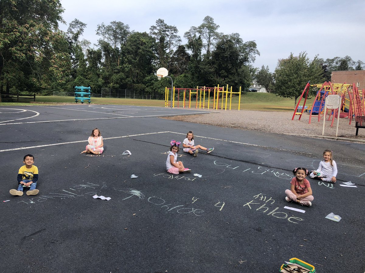First week of hybrid kindergarten 🖍 💙✏️ outside for a 😷 break and practicing our names with sidewalk chalk!